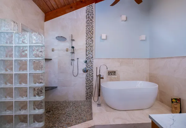 a view of a lake with couches and city view