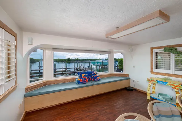 a view of balcony and floor to ceiling window