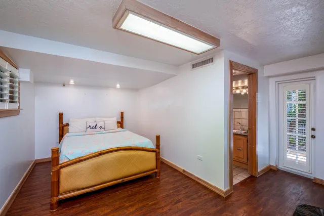 a view of a swimming pool with a lounge chairs