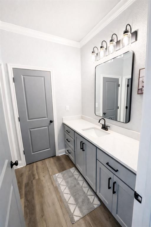 224 Fox Run Lane Robinson, TX 76706 - Photo 17 of 24 a bathroom with a double vanity sink and mirror