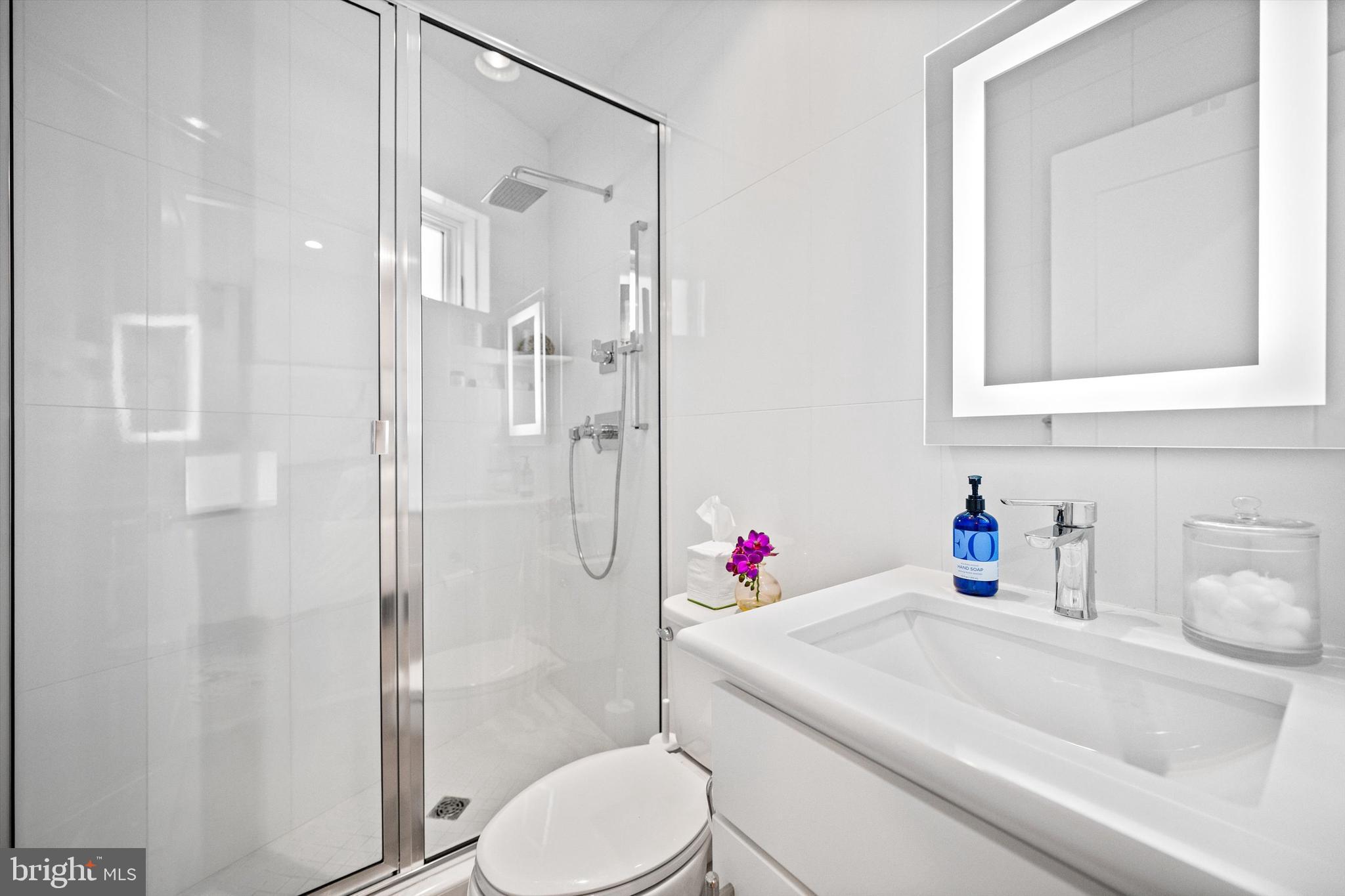1717 V Street Northwest Washington, DC 20009 - Photo 11 of 40 a bathroom with a sink toilet and shower