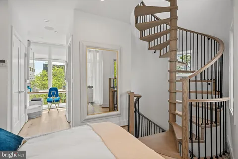 a view of entryway with wooden floor