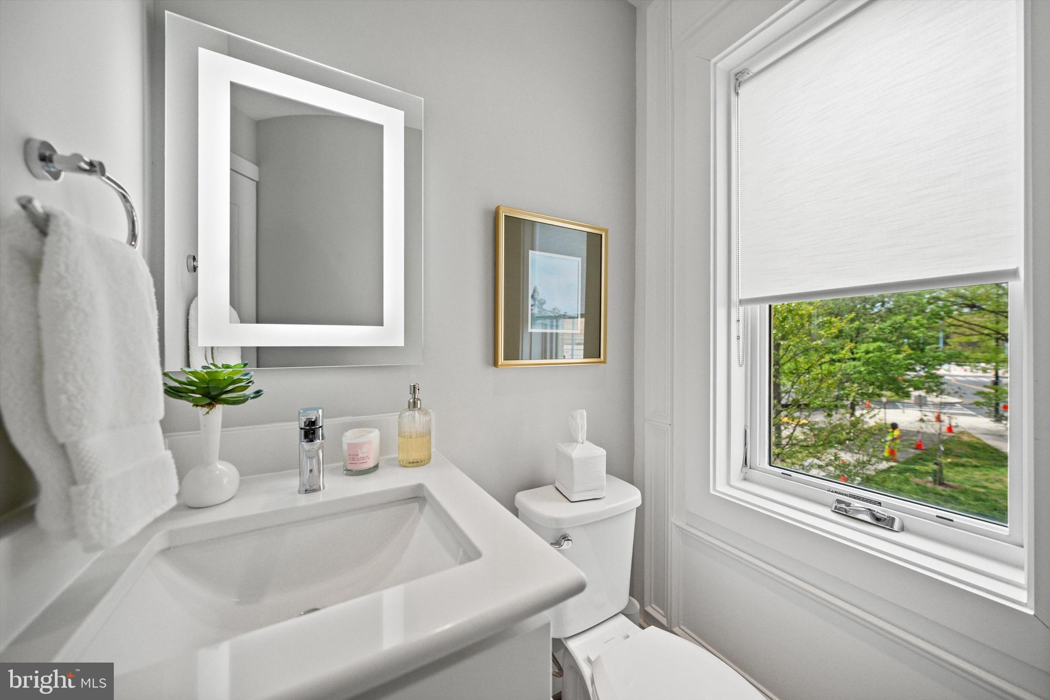 1717 V Street Northwest Washington, DC 20009 - Photo 20 of 40 a bathroom with a sink toilet and tub