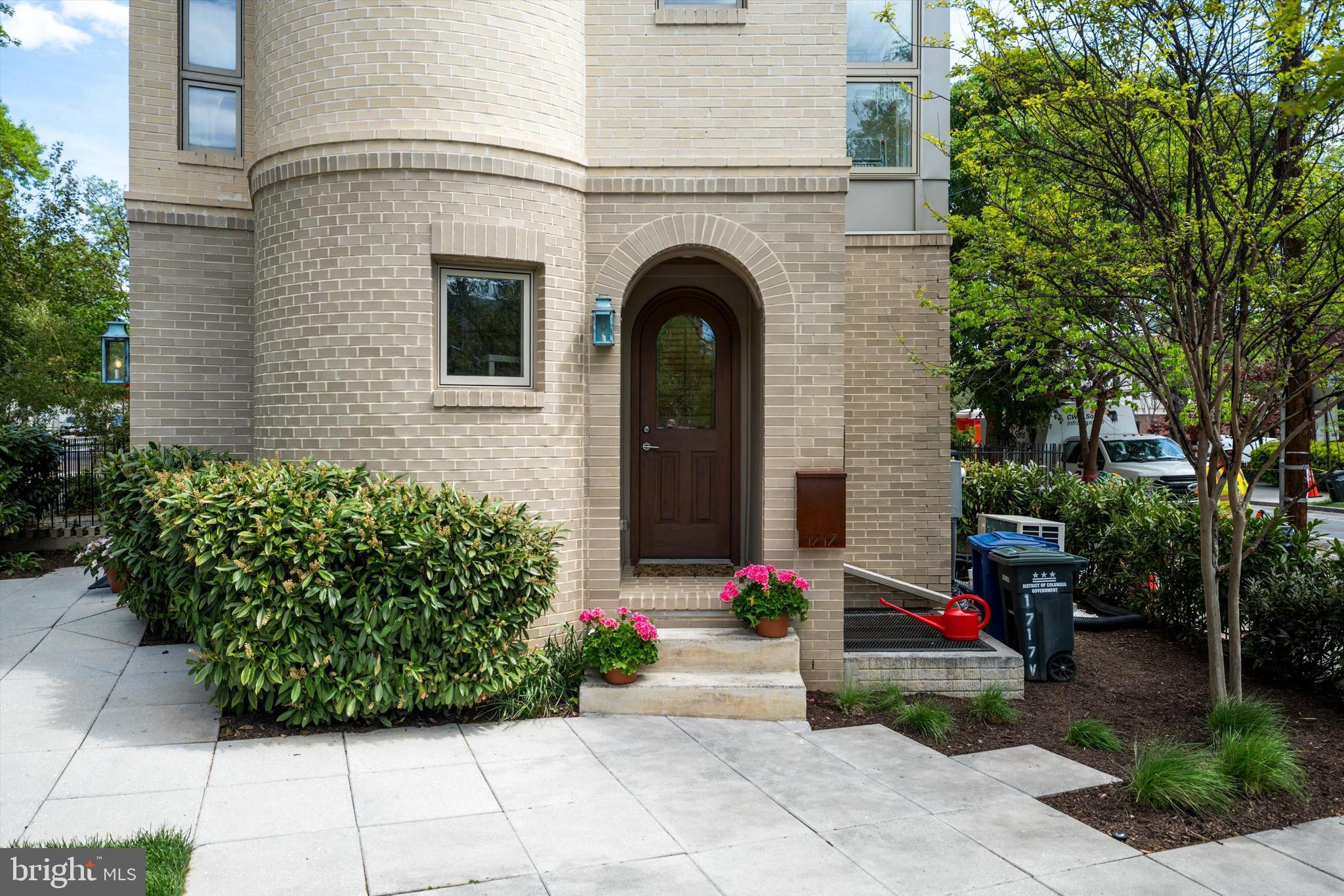 1717 V Street Northwest Washington, DC 20009 - Photo 4 of 40 a view of a house with a flower garden