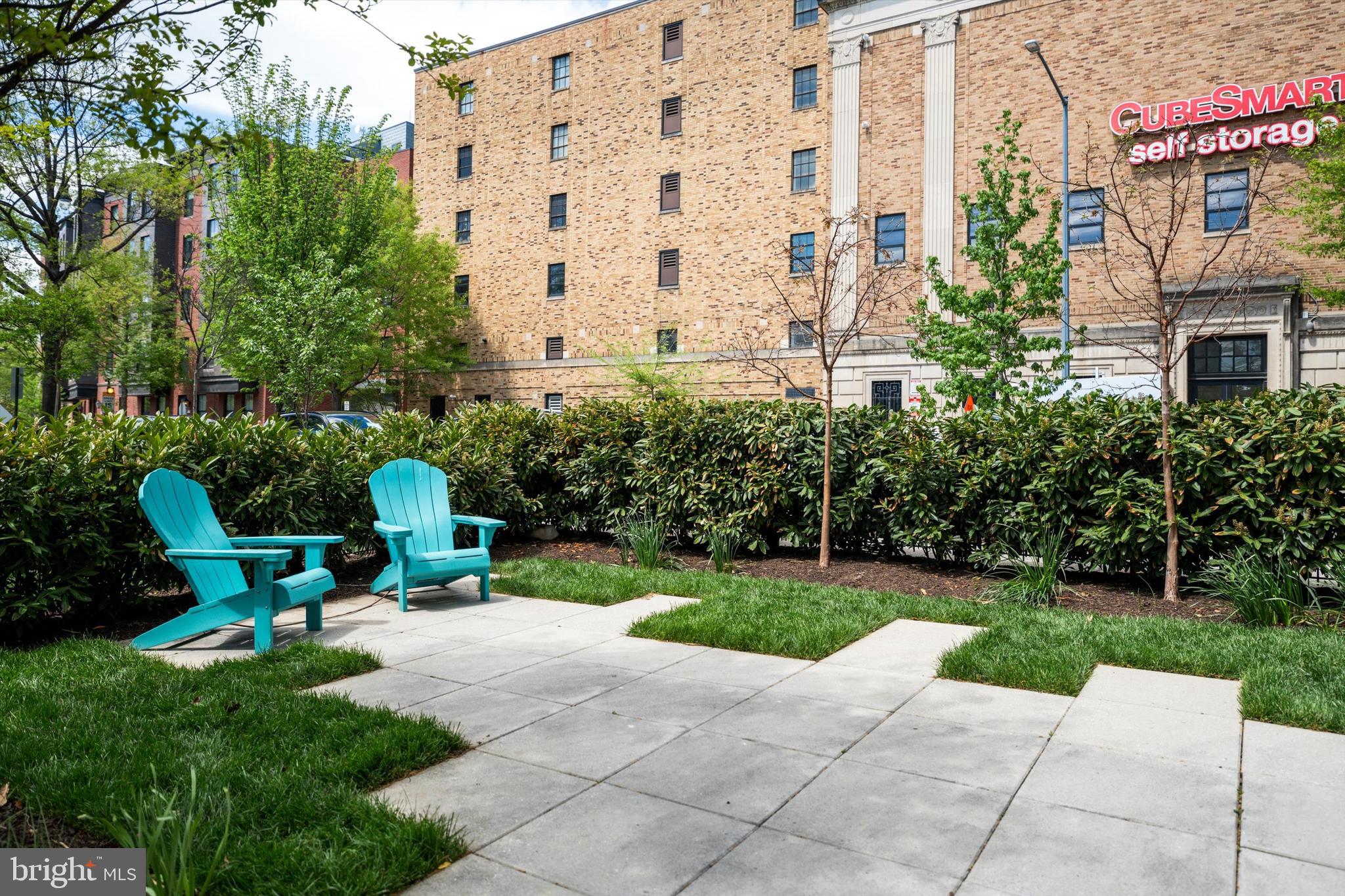 1717 V Street Northwest Washington, DC 20009 - Photo 5 of 40 a view of a building with garden and sitting area