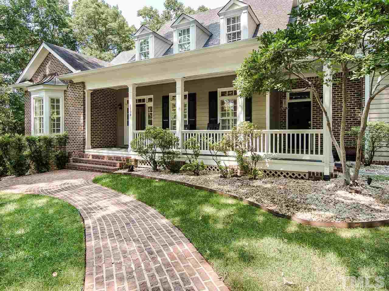 1108 Wagon Ridge Road Raleigh, NC 27614 - Photo 1 of 25 a front view of house with yard and green space