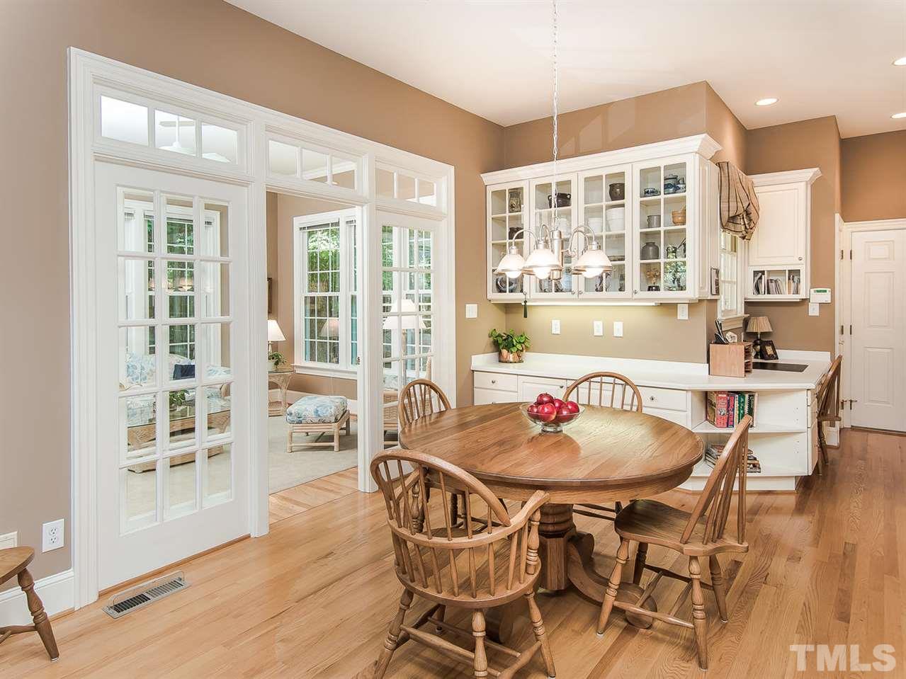 1108 Wagon Ridge Road Raleigh, NC 27614 - Photo 11 of 25 a dining room with furniture window and wooden floor