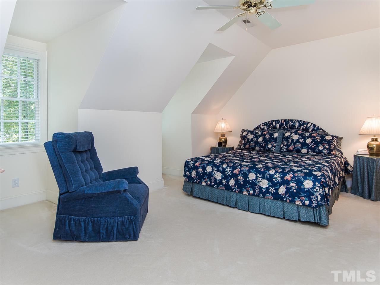 1108 Wagon Ridge Road Raleigh, NC 27614 - Photo 16 of 25 a bedroom with a bed and window