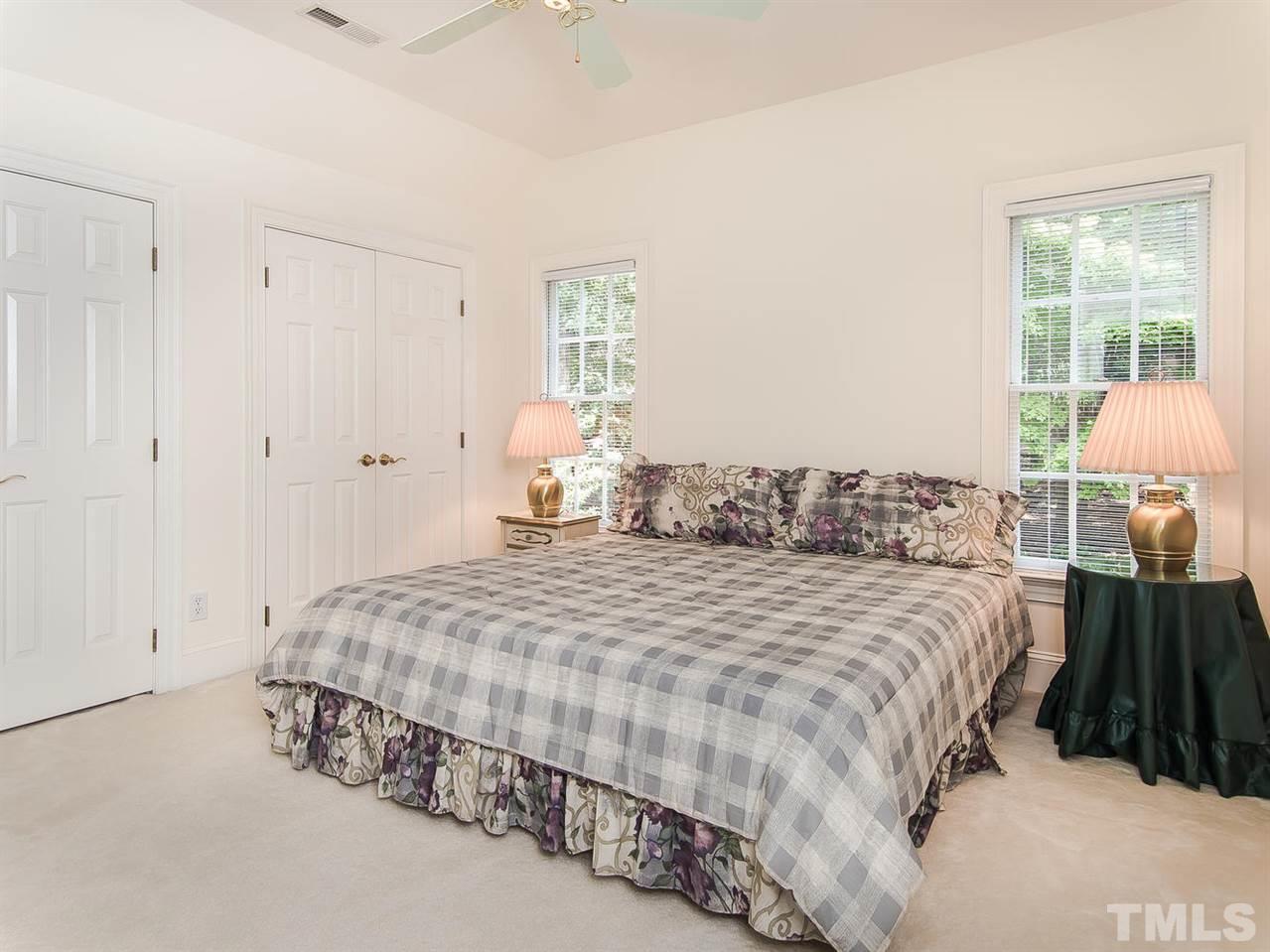 1108 Wagon Ridge Road Raleigh, NC 27614 - Photo 18 of 25 a bedroom with a bed and a window