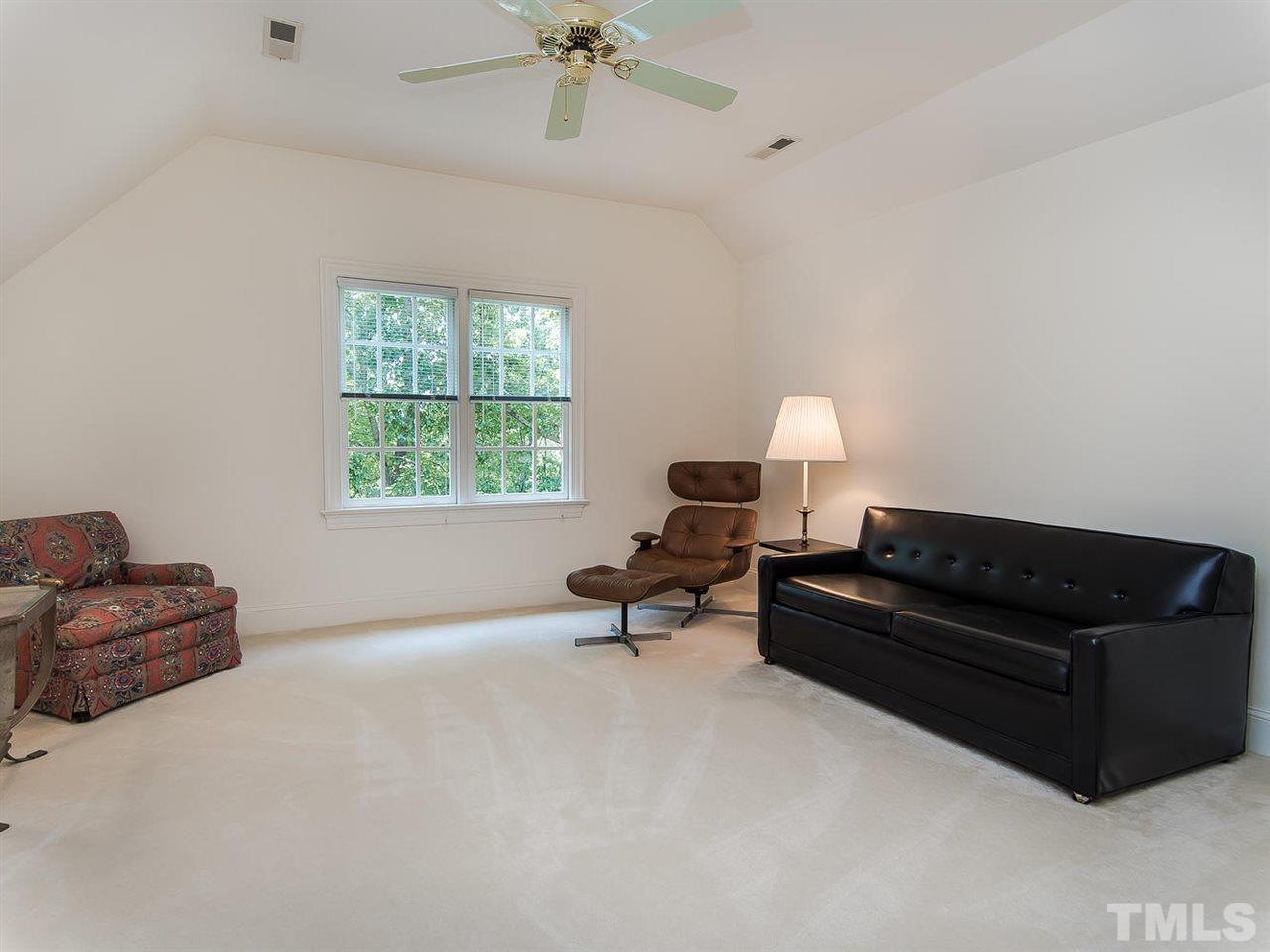 1108 Wagon Ridge Road Raleigh, NC 27614 - Photo 19 of 25 a living room with furniture window and a window