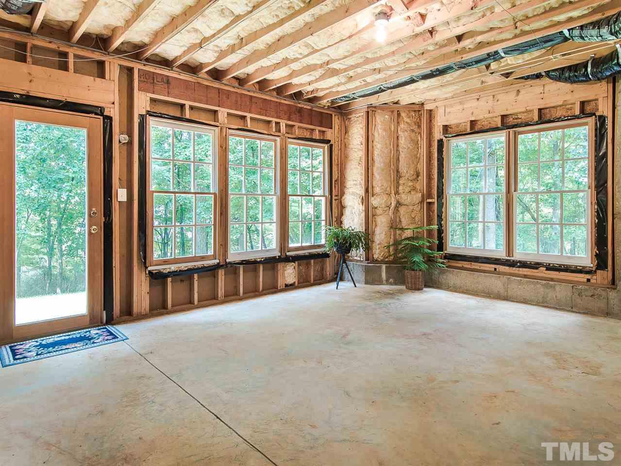 1108 Wagon Ridge Road Raleigh, NC 27614 - Photo 22 of 25 a view of an empty room with windows