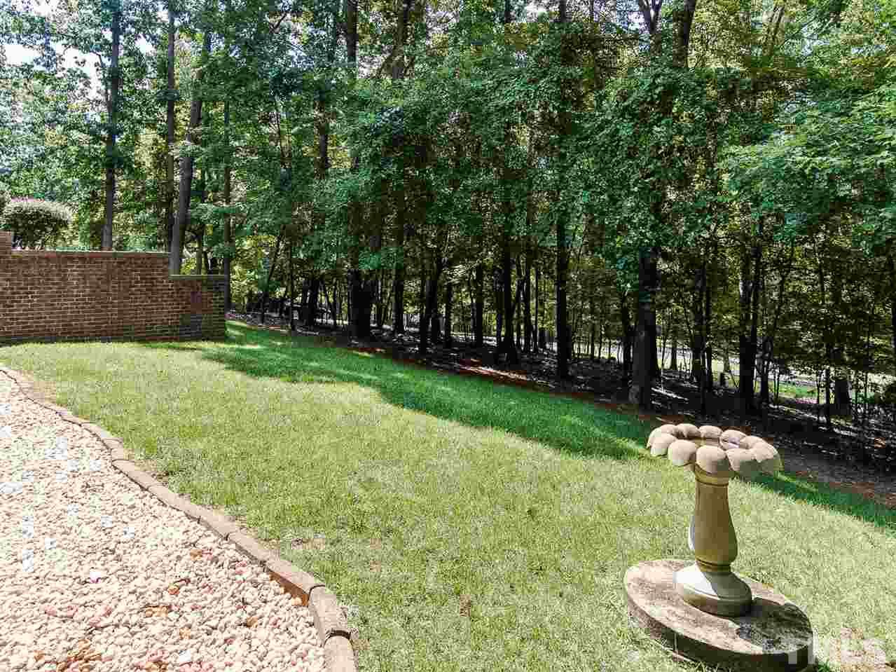 1108 Wagon Ridge Road Raleigh, NC 27614 - Photo 24 of 25 a front view of a house with garden