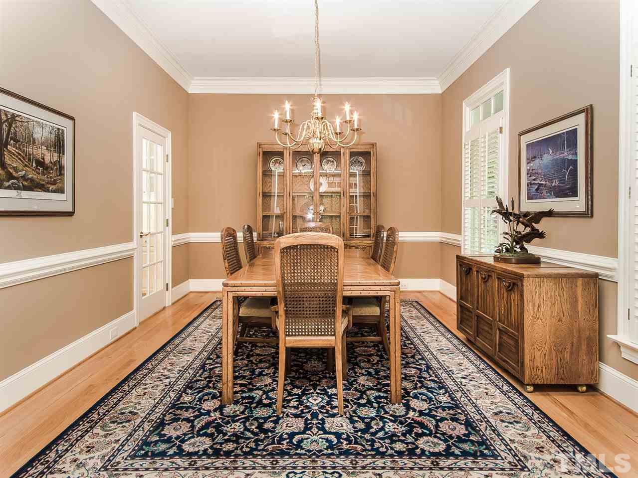 1108 Wagon Ridge Road Raleigh, NC 27614 - Photo 6 of 25 a view of a dining room with furniture window and wooden floor