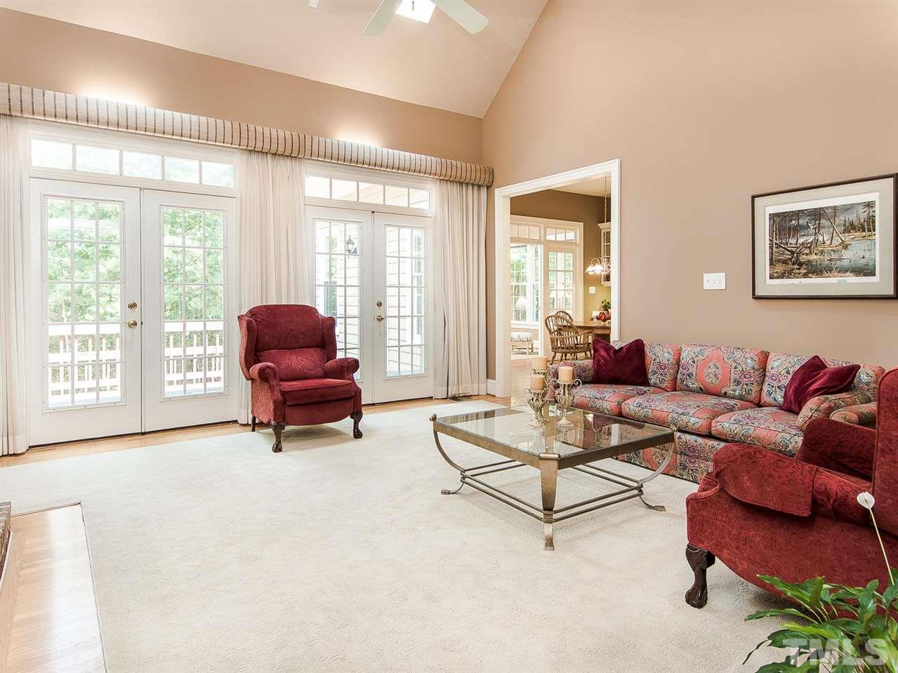1108 Wagon Ridge Road Raleigh, NC 27614 - Photo 7 of 25 a living room with furniture and a large window