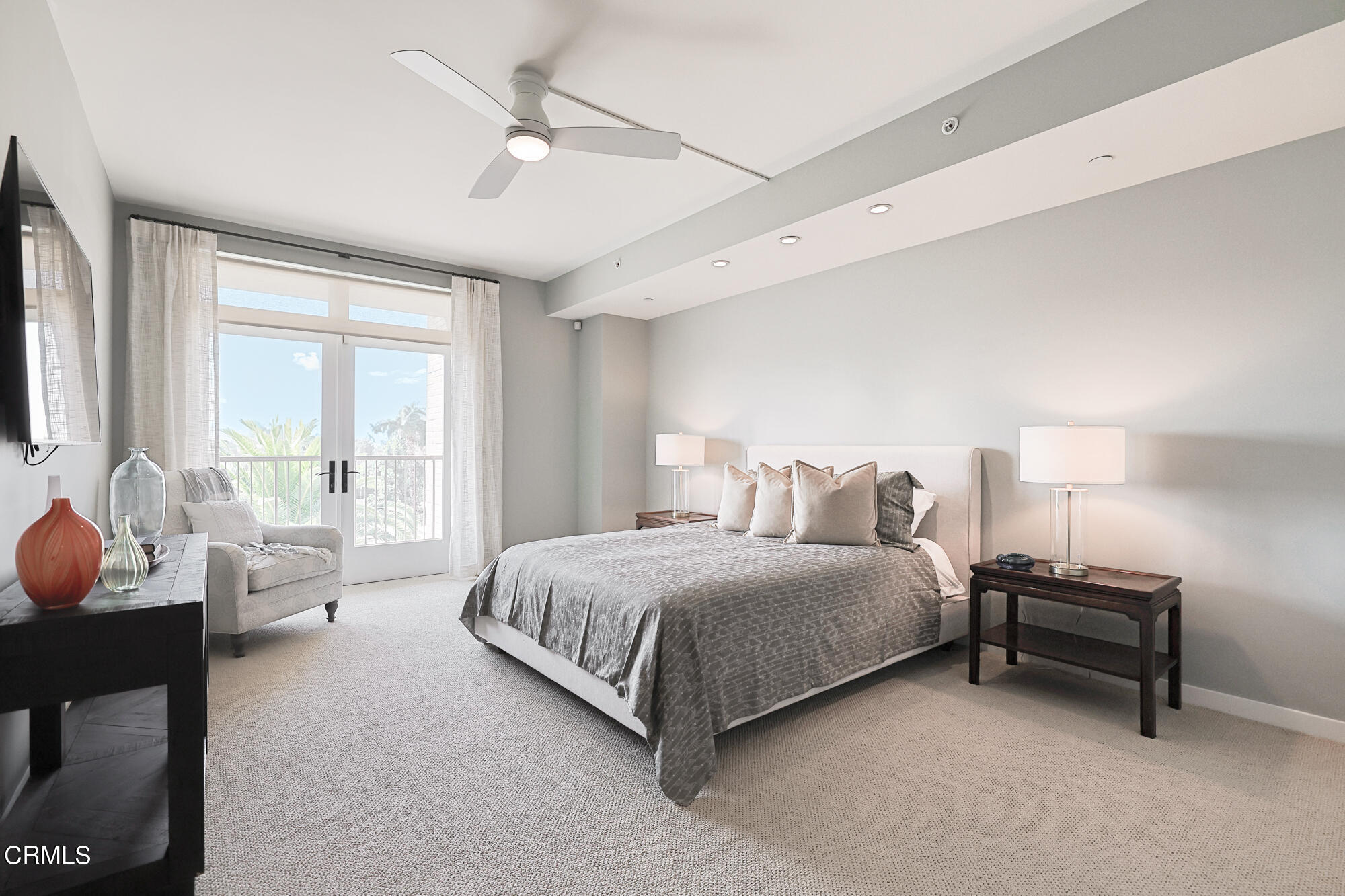 920 Granite Drive, Unit 509 Pasadena, CA 91101 - Photo 11 of 24 a spacious bedroom with a bed and a chandelier