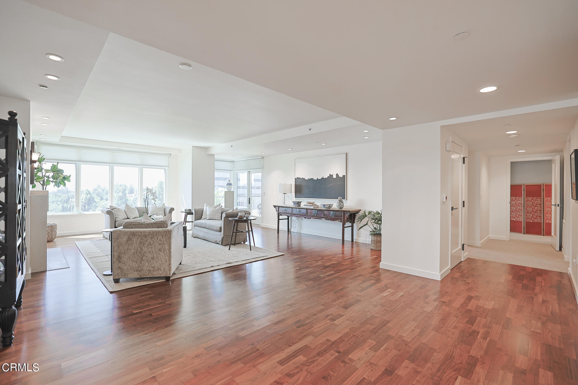 920 Granite Drive, Unit 509 Pasadena, CA 91101 - Photo 2 of 24 a living room with furniture and a wooden floor