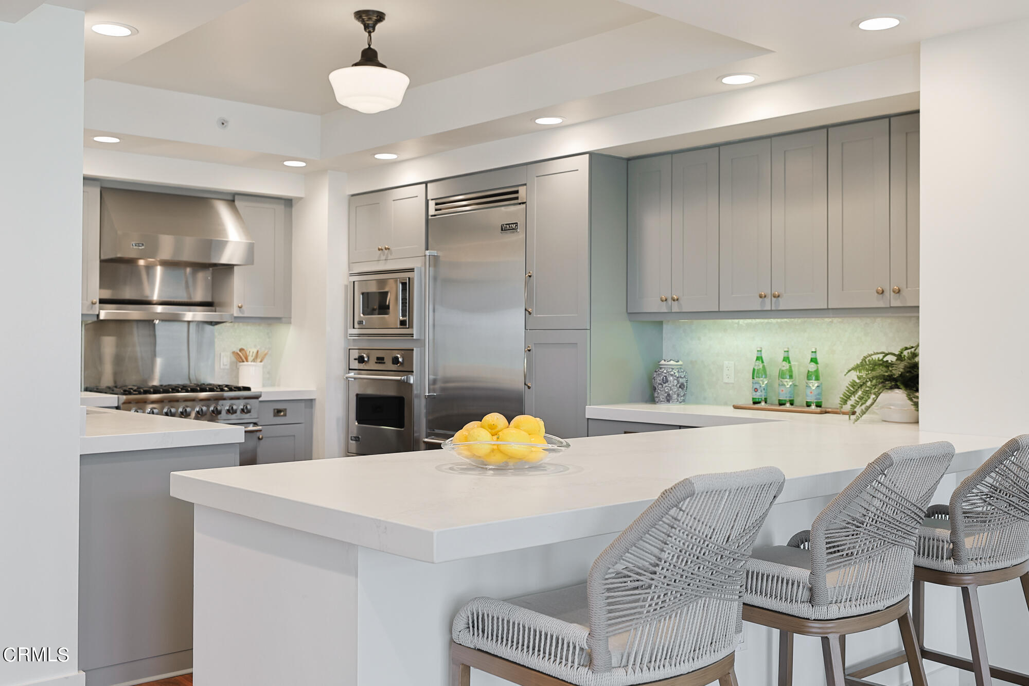 920 Granite Drive, Unit 509 Pasadena, CA 91101 - Photo 7 of 24 a kitchen with stainless steel appliances granite countertop a sink and a refrigerator