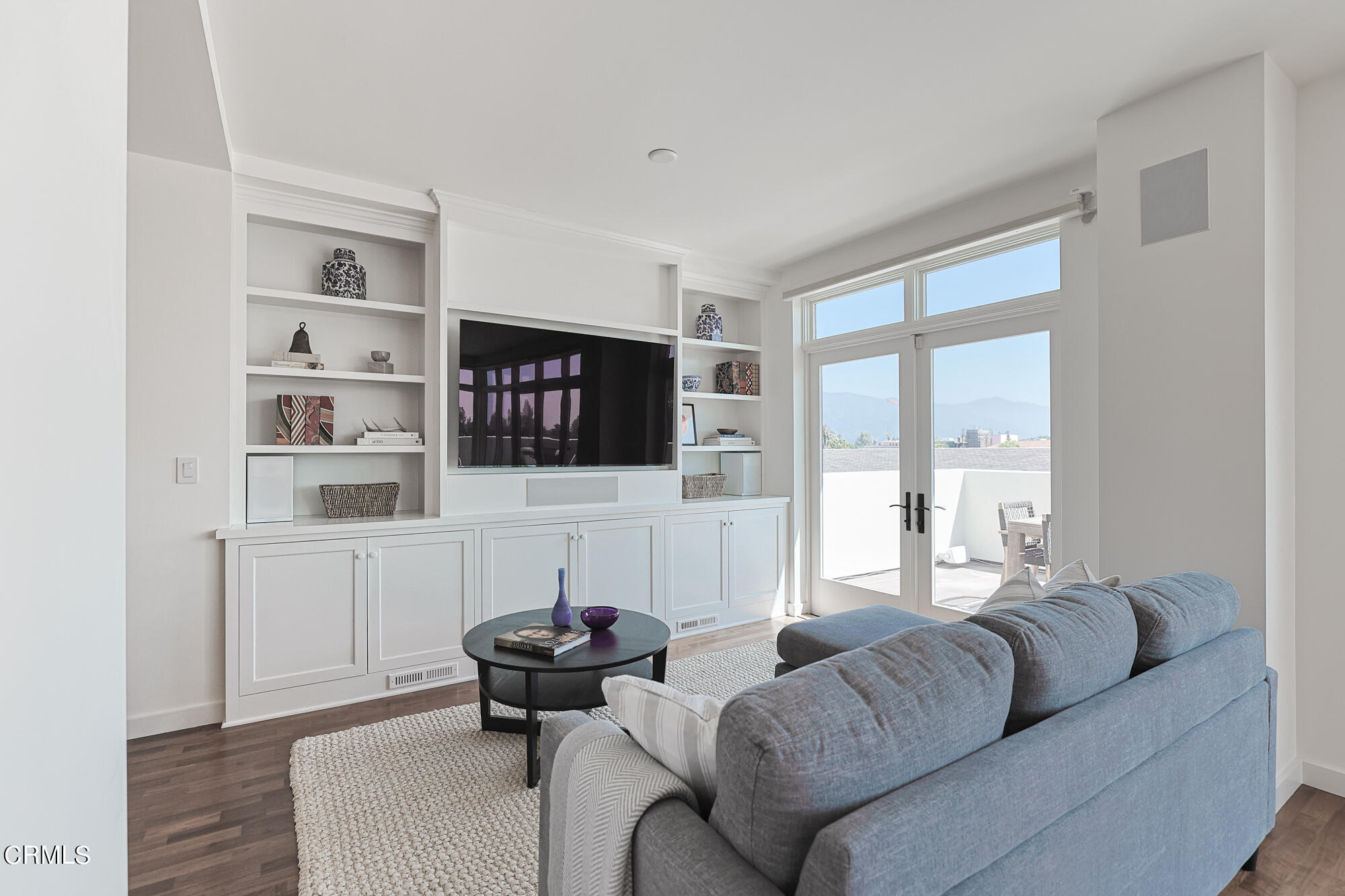 920 Granite Drive, Unit 509 Pasadena, CA 91101 - Photo 9 of 24 a living room with furniture fireplace and a flat screen tv