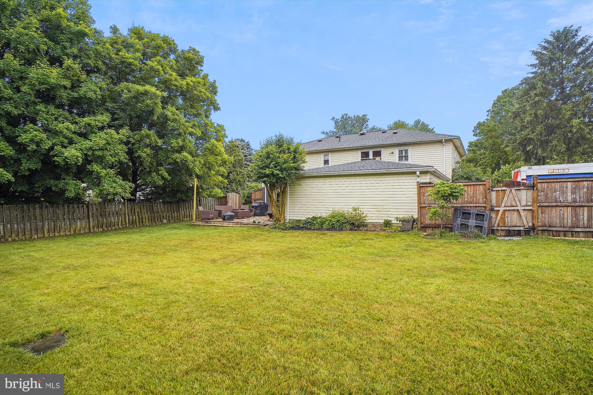 18709 Bloomfield Road Olney, MD 20832 - Photo 46 of 56 a view of a house with pool and a yard