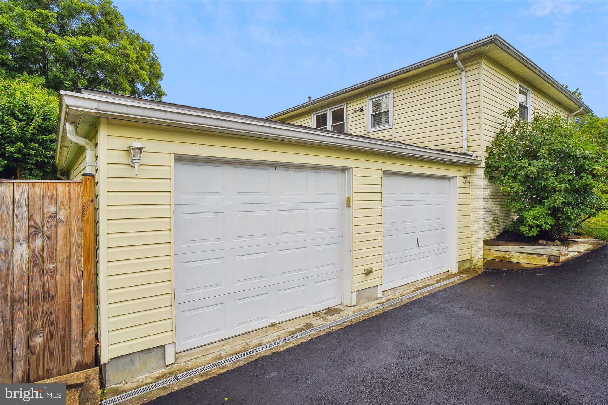 18709 Bloomfield Road Olney, MD 20832 - Photo 50 of 56 a front view of a house with a garage