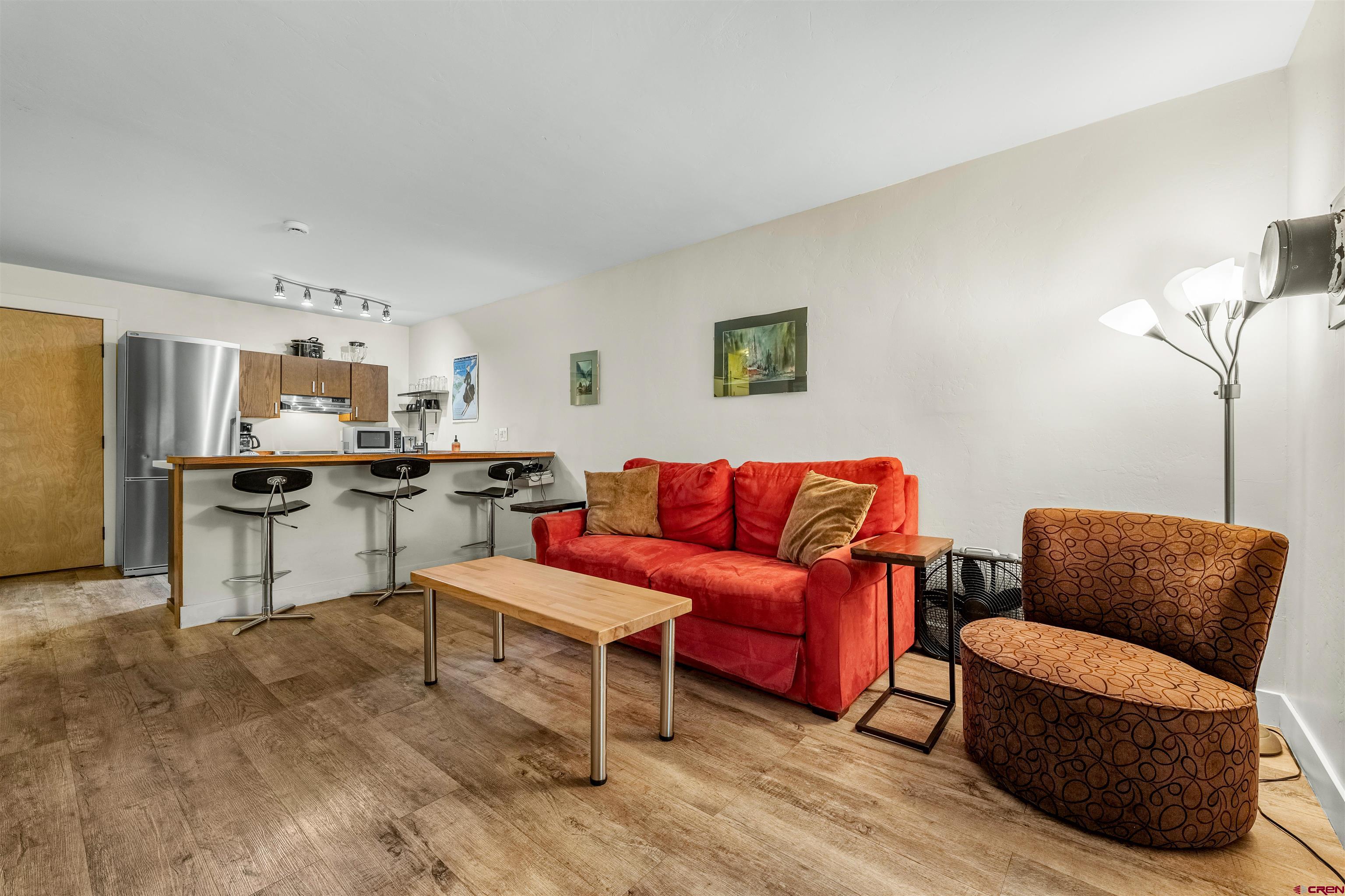 455 Sheol Street, Unit 209 Durango, CO 81301 - Photo 11 of 30 a living room with furniture and kitchen view