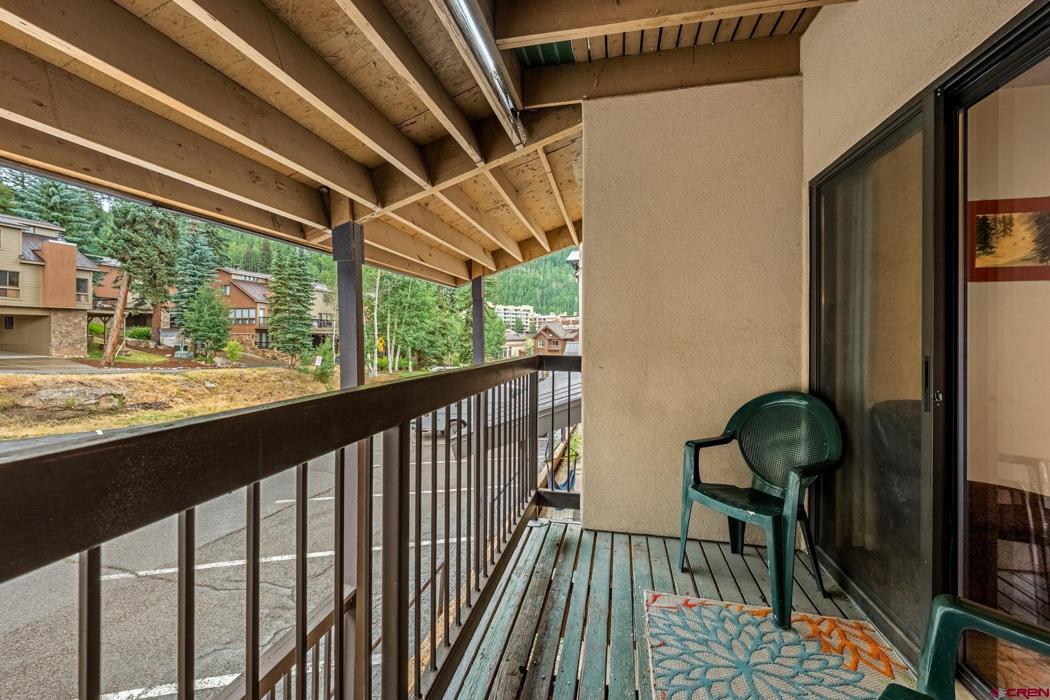 455 Sheol Street, Unit 209 Durango, CO 81301 - Photo 17 of 30 a view of a porch with furniture and backyard