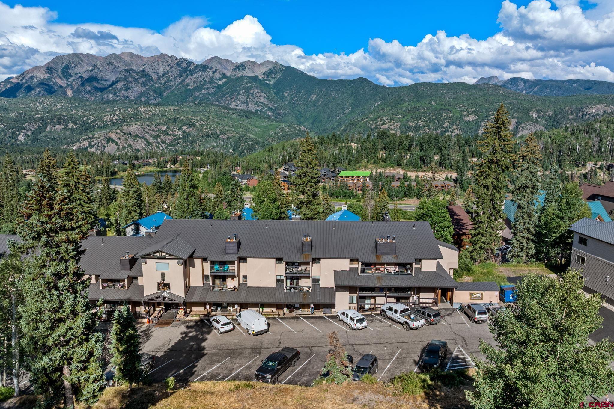 455 Sheol Street, Unit 209 Durango, CO 81301 - Photo 23 of 30 an aerial view of a house with a yard lake and mountain view in back