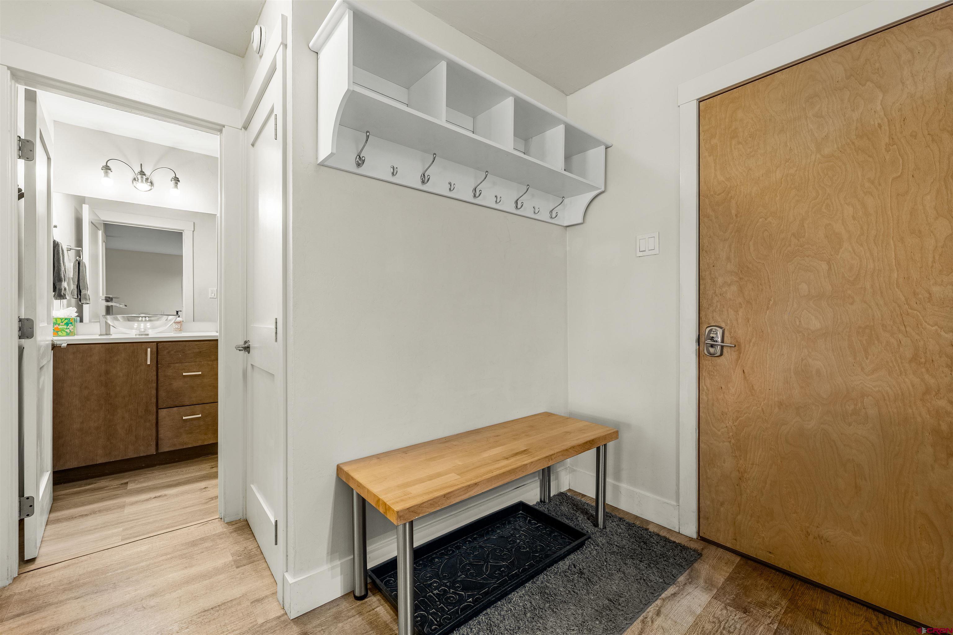 455 Sheol Street, Unit 209 Durango, CO 81301 - Photo 4 of 30 a room with a bench and a sink