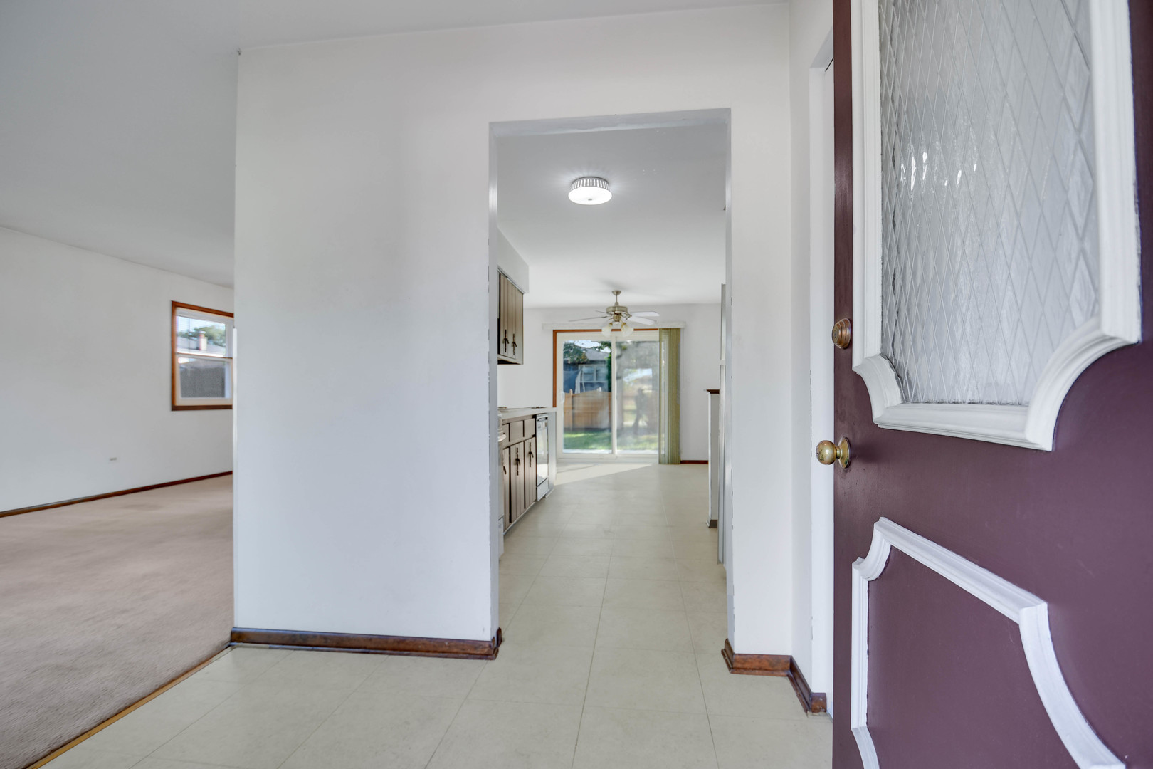 11201 Deerpath Lane Palos Hills, IL 60465 - Photo 2 of 25 a view of hallway with livingroom and wooden floor