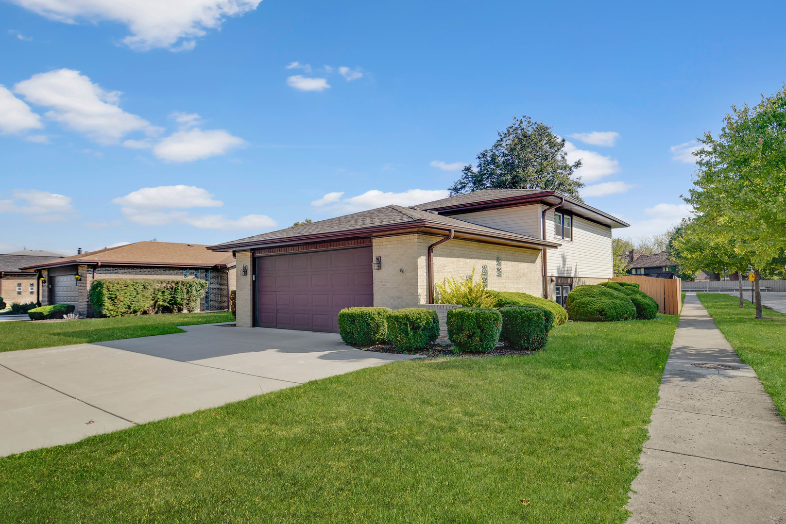 11201 Deerpath Lane Palos Hills, IL 60465 - Photo 22 of 25 a front view of a house with a yard