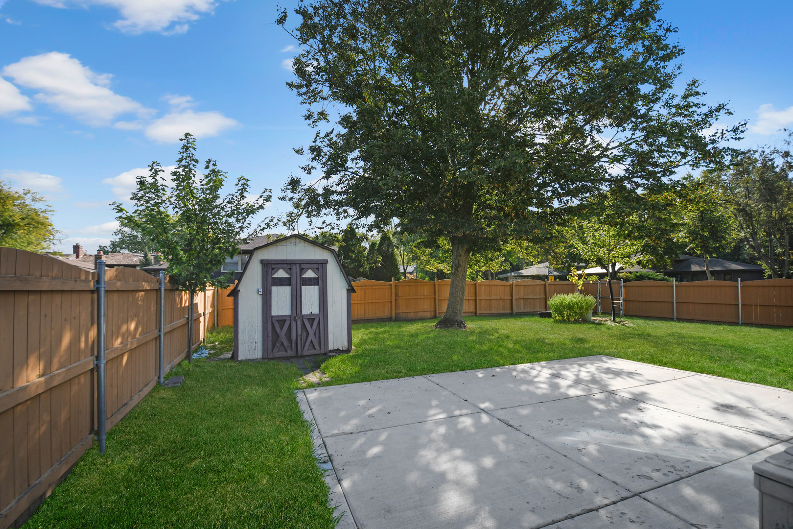 11201 Deerpath Lane Palos Hills, IL 60465 - Photo 24 of 25 a brick house with trees in the background