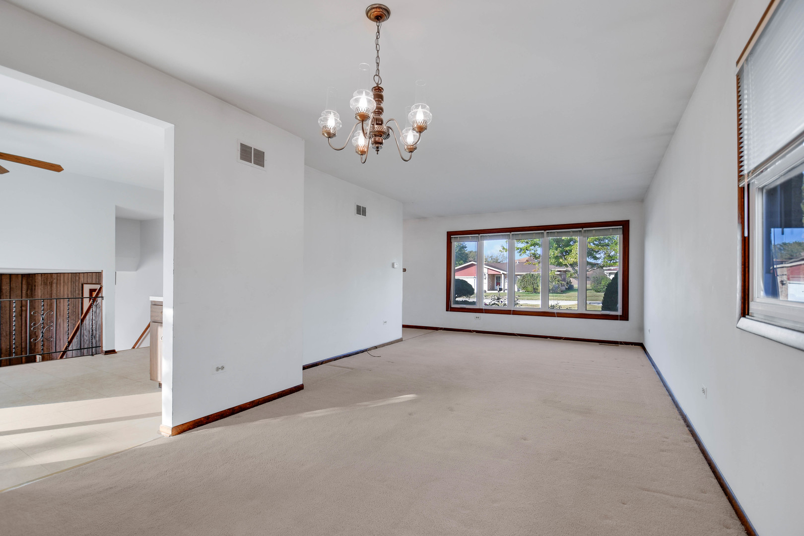 11201 Deerpath Lane Palos Hills, IL 60465 - Photo 3 of 25 a view of an empty room with window