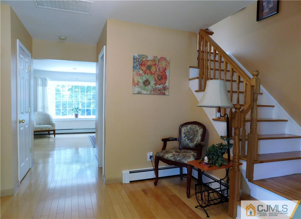 18 Lynnwood Road Edison, NJ 08820 - Photo 3 of 25 a view of a livingroom with furniture and hardwood floor