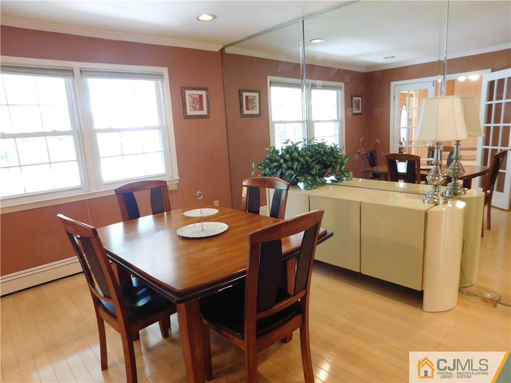 18 Lynnwood Road Edison, NJ 08820 - Photo 8 of 25 a view of a dining room with furniture and window