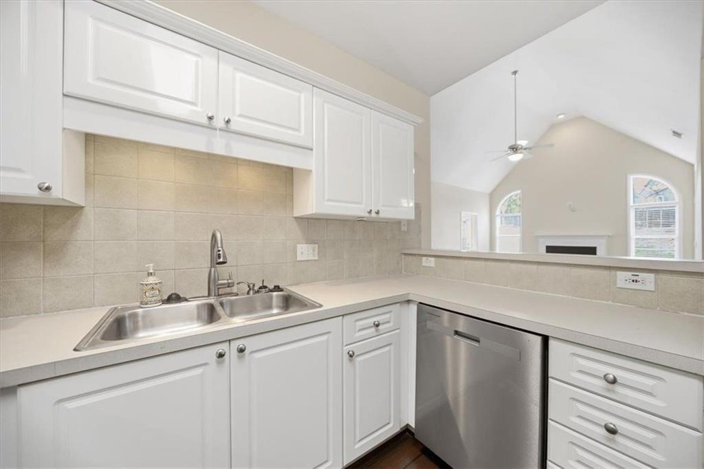 111 Stonegate Lane Canton, GA 30114 - Photo 13 of 30 a kitchen with white cabinets and a sink