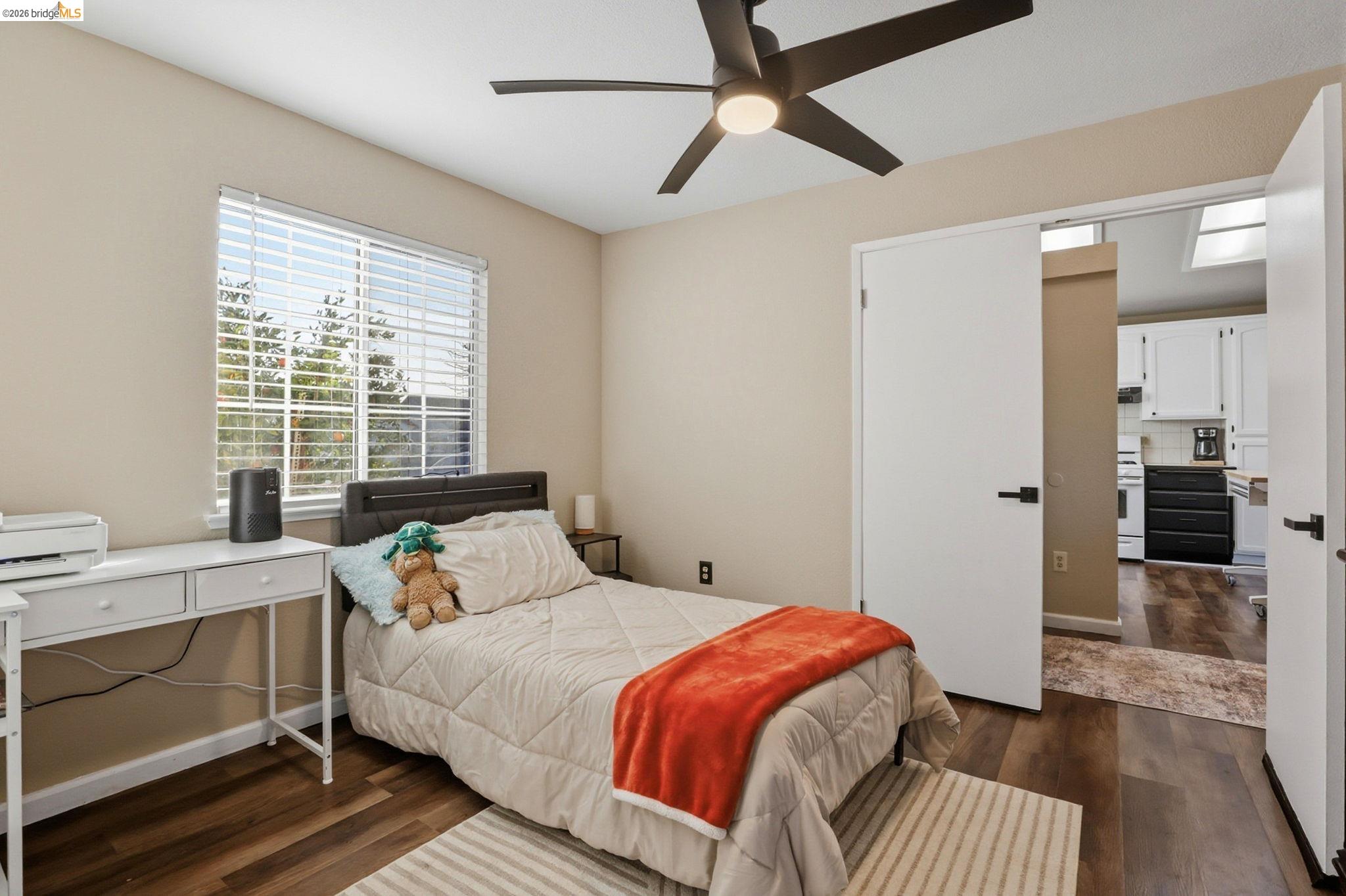 799 Morgans Ranch Circle Galt, CA 95632 - Photo 20 of 36 Bedroom with dark wood-type flooring and a ceiling fan