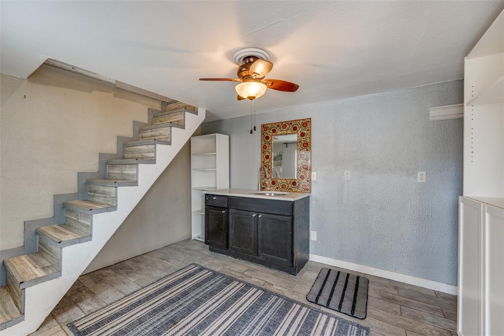 8535 Strathmore Drive Dallas, TX 75238 - Photo 18 of 23 a view of entryway and hall with wooden floor