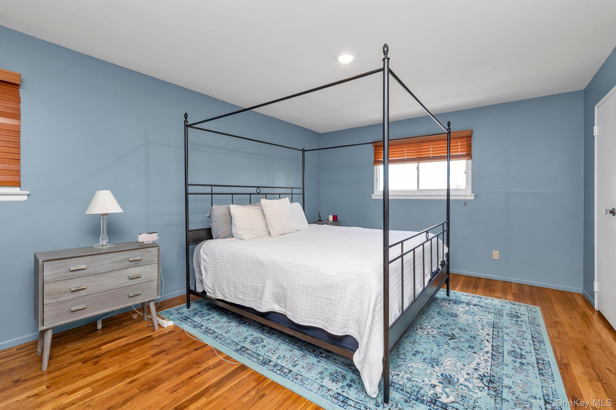 2038 Ripley Lane Merrick, NY 11566 - Photo 16 of 22 Bedroom with hardwood floors