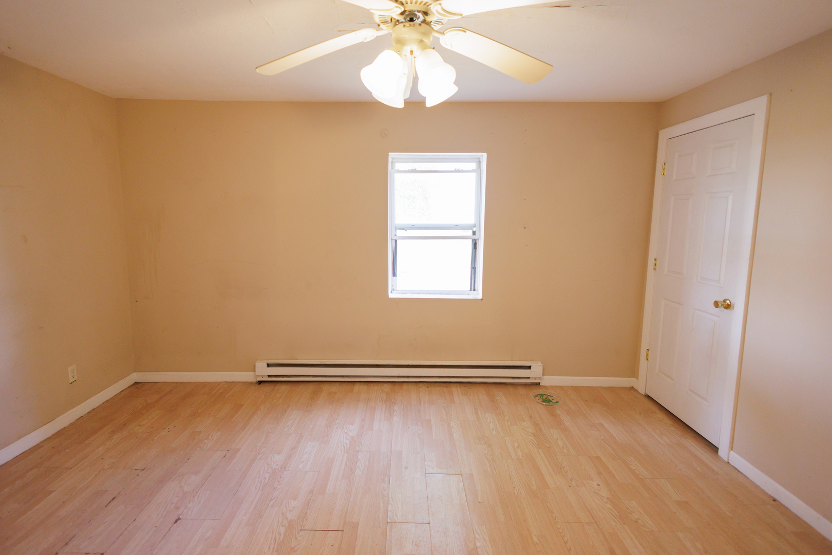2060 West 5000S Road Chebanse, IL 60922 - Photo 15 of 54 wooden floor in an empty room with a window