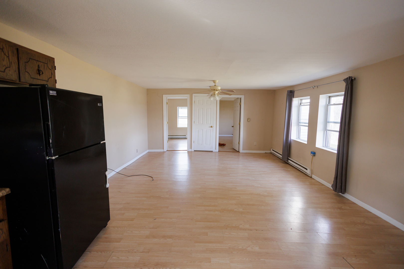 2060 West 5000S Road Chebanse, IL 60922 - Photo 7 of 54 a view of a livingroom with wooden floor and a kitchen