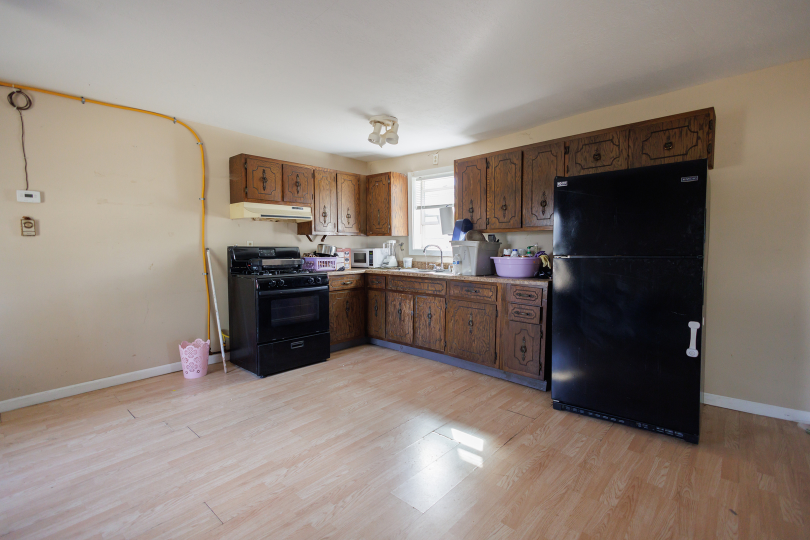 2060 West 5000S Road Chebanse, IL 60922 - Photo 8 of 54 a kitchen with stainless steel appliances granite countertop a refrigerator and a sink