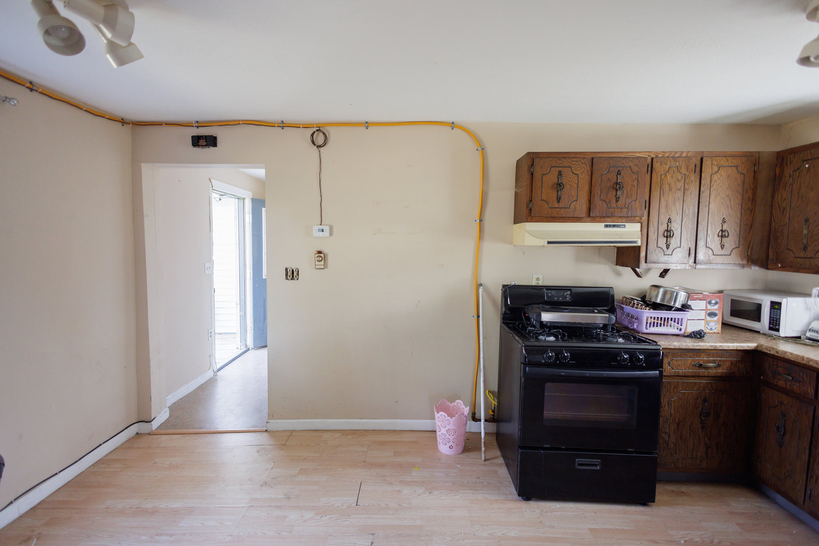 2060 West 5000S Road Chebanse, IL 60922 - Photo 9 of 54 a kitchen with stainless steel appliances a stove a refrigerator and cabinets