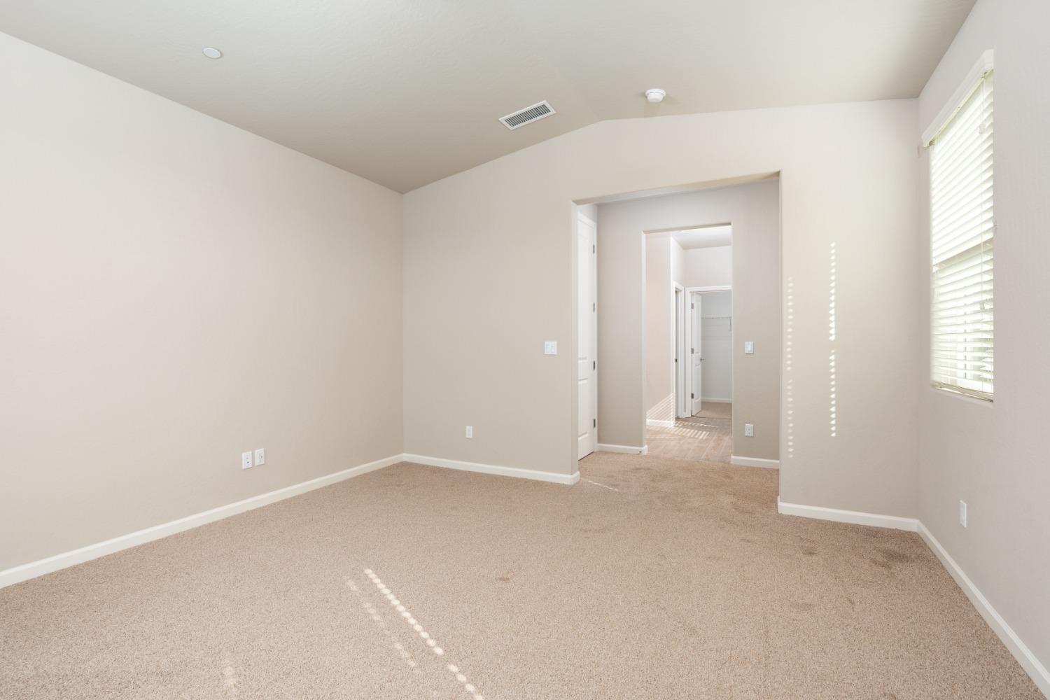 952 Pinnacle Drive Madera, CA 93636 - Photo 20 of 32 a view of an empty room with a window