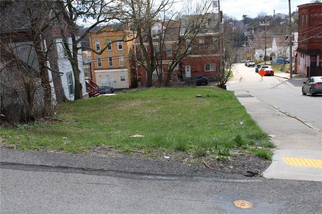 2206 Elsie Street Pittsburgh, PA 15210 - Photo 3 of 11 a view of a street with a building in the background