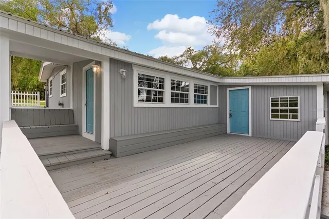 a backyard of a house with lots of green space
