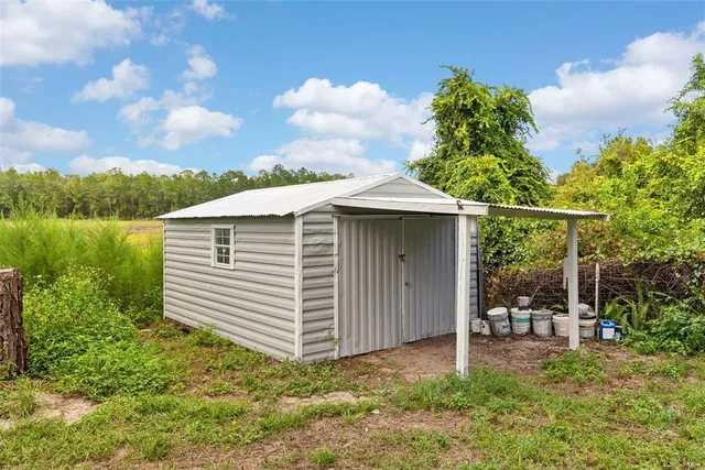 a building with trees in the background