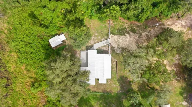 a view of a yard with an outdoor space
