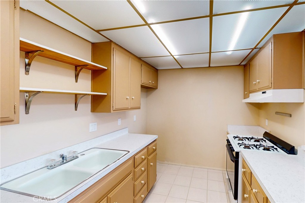 6600 Warner Avenue, Unit 88 Huntington Beach, CA 92647 - Photo 11 of 25 a bathroom with a sink and a mirror