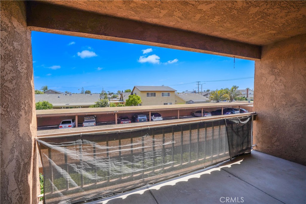 6600 Warner Avenue, Unit 88 Huntington Beach, CA 92647 - Photo 14 of 25 a view of a balcony with an outdoor space