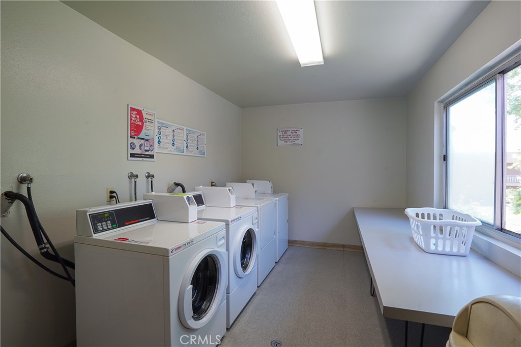6600 Warner Avenue, Unit 88 Huntington Beach, CA 92647 - Photo 20 of 25 a utility room with dryer and washer